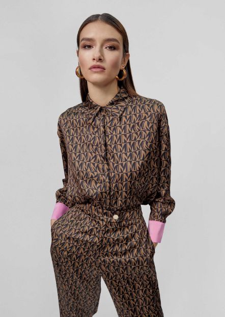 Pantalón sedoso con estampado M combinado chocolate y negro, de Lola Casademunt